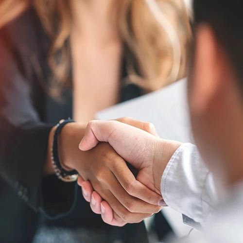 Chiropractic Knoxville TN Doctor and Client Shaking Hands